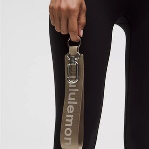 Lululemon Never Lost Keychain- Warm Ash Grey/Light Ivory